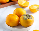 persimmon (Rs.55/Piece)